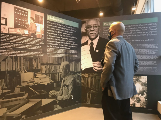 Head Griot (docent) Reggie Jackson helps visitors expand their knowledge and understanding of the long history of Black American achievement. (Dr. Fran Kaplan, ABHM)