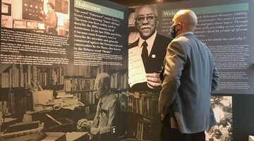 Head Griot (docent) Reggie Jackson helps visitors expand their knowledge and understanding of the long history of Black American achievement. (Dr. Fran Kaplan, ABHM)